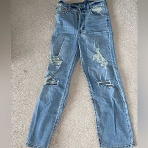 HARDLY WORN: Ripped straight leg denim jeans.